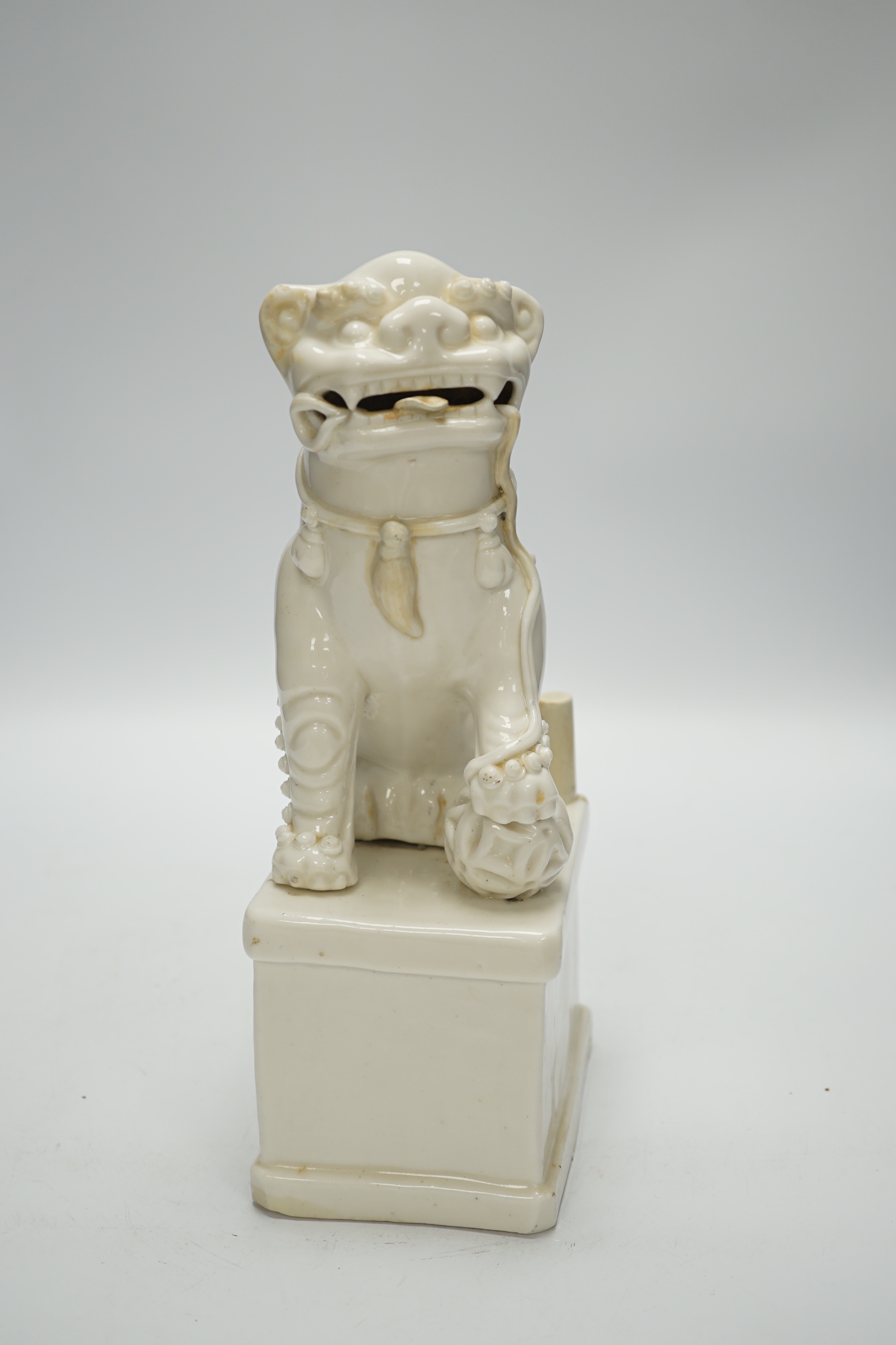 A Chinese blanc de chine Buddhist lion, Kangxi period, 27cm